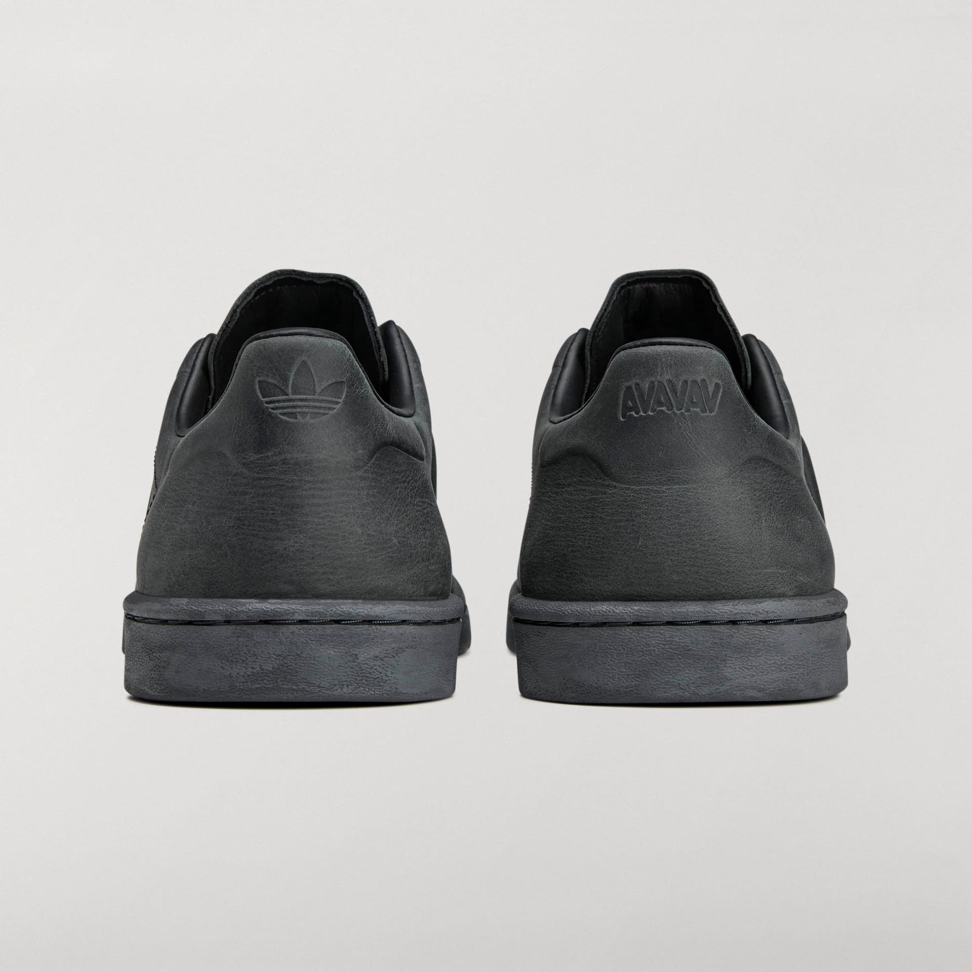 Back view of the adidas Originals by Avavav Modified Superstar in black, showing the embossed heel logos.