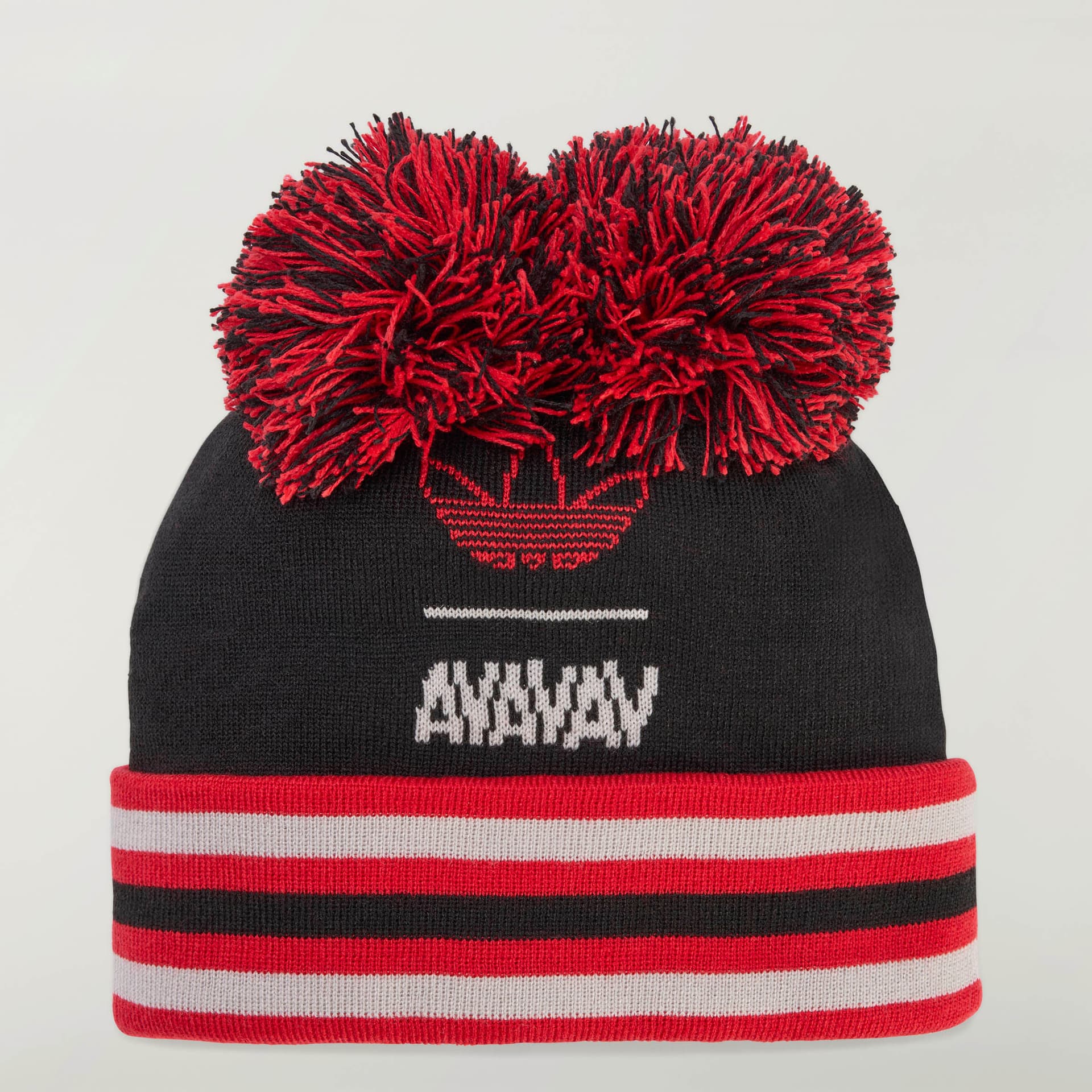 Front view of the black adidas Originals by Avavav beanie, featuring a striped cuff, and two large red and black pom poms.