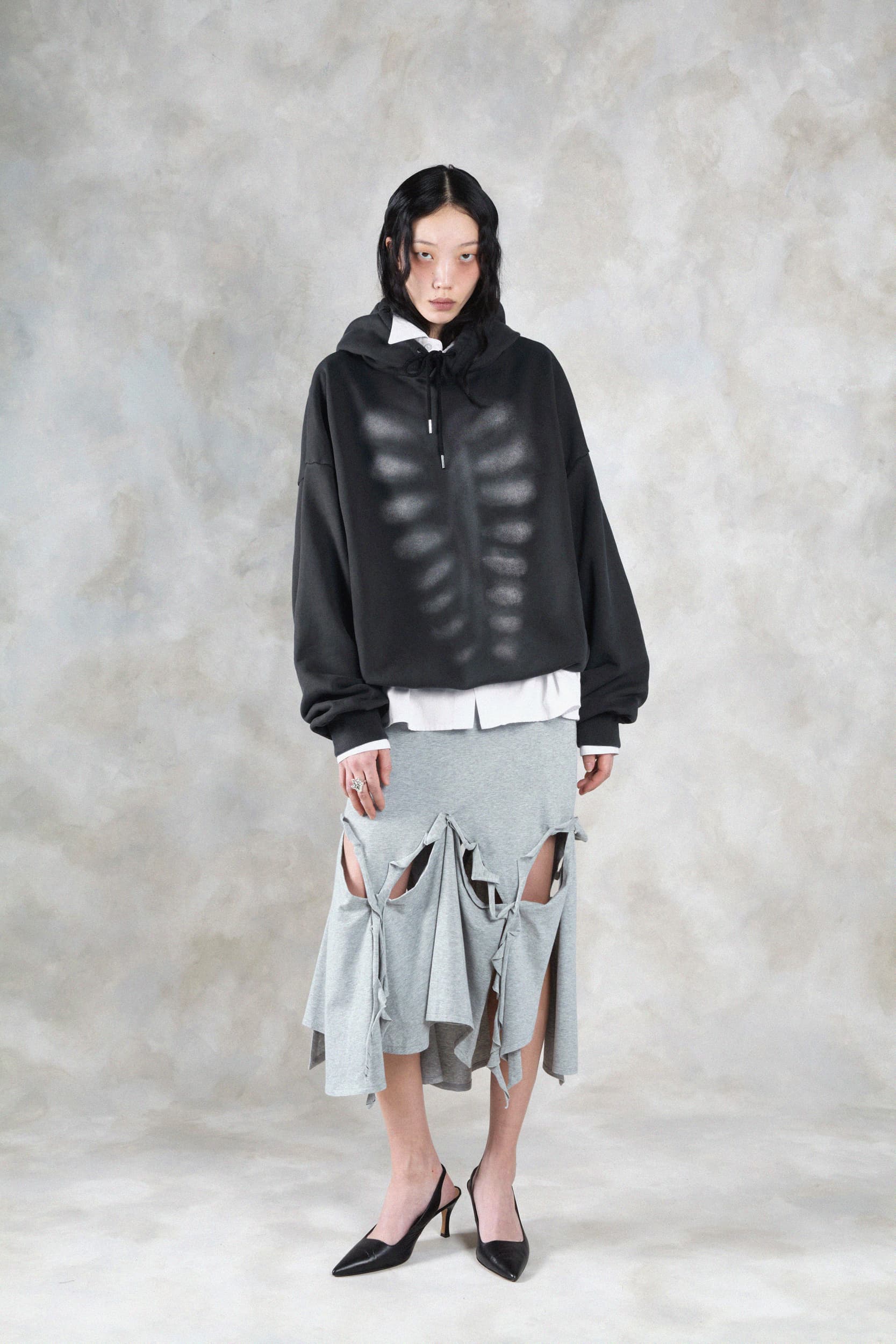 1379_c78ae4e4da-avavav_fw26_lookbook_f26_hod_34_trevor_xray_hoodie_black0107-copy-2-mega